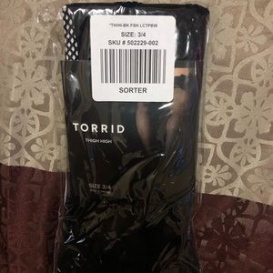 Thigh high fishnet socks